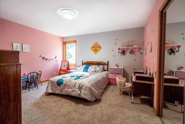 bedroom with carpet and visible vents