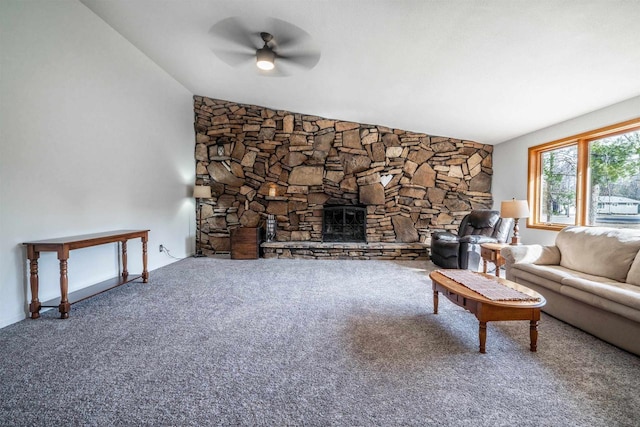 unfurnished living room featuring carpet floors, lofted ceiling, ceiling fan, and a fireplace