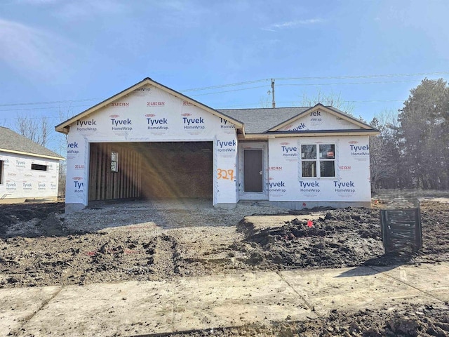 property under construction featuring a garage