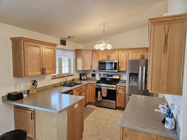 kitchen with a peninsula, lofted ceiling, a sink, stainless steel appliances, and a chandelier