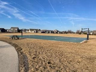 view of property's community with community basketball court