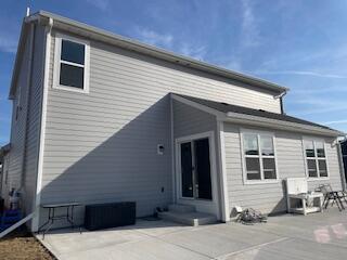 rear view of property with a patio area