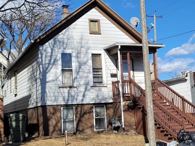 view of front of property with a chimney