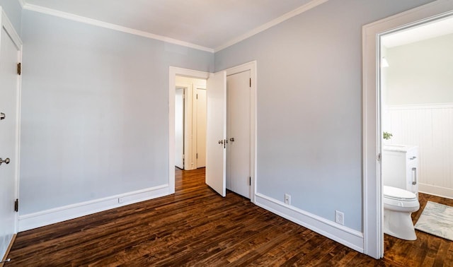 unfurnished bedroom with ensuite bath, wood finished floors, and crown molding