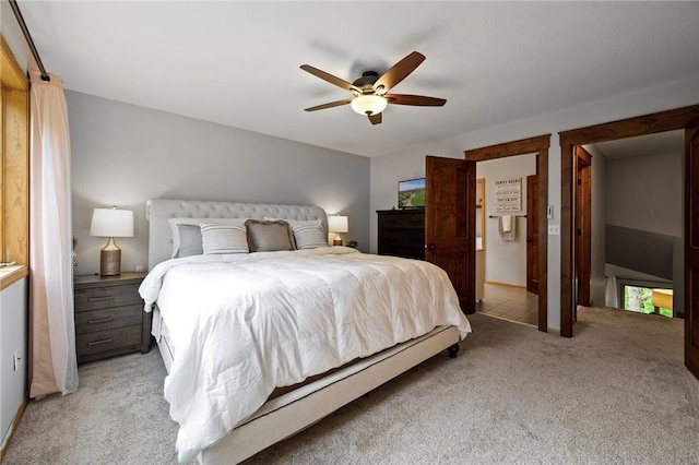 bedroom with light colored carpet and ceiling fan