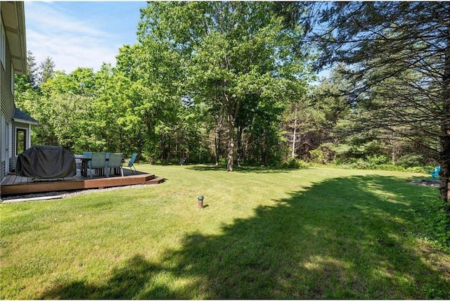 view of yard featuring a deck