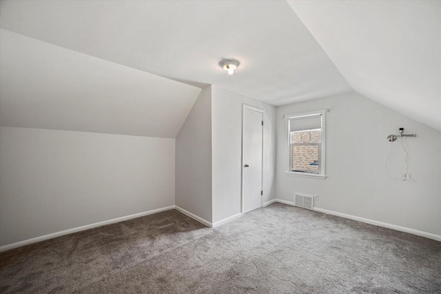 bonus room with visible vents, carpet flooring, and baseboards