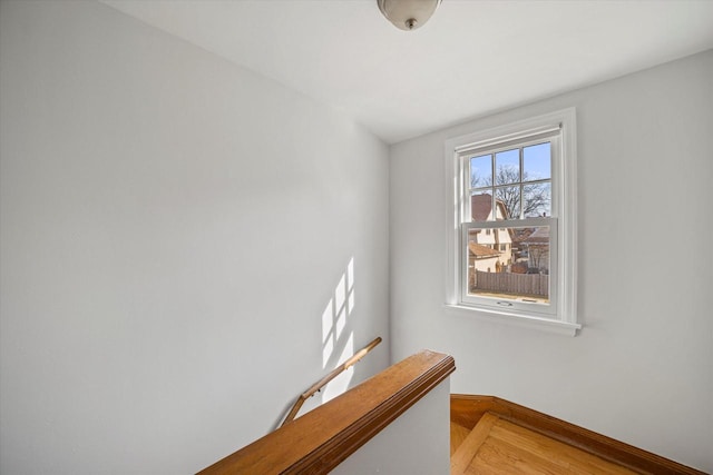 interior space featuring baseboards and light wood-type flooring