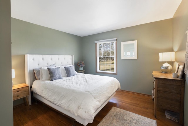 bedroom featuring wood finished floors