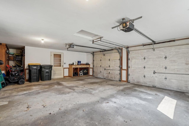 garage featuring a garage door opener