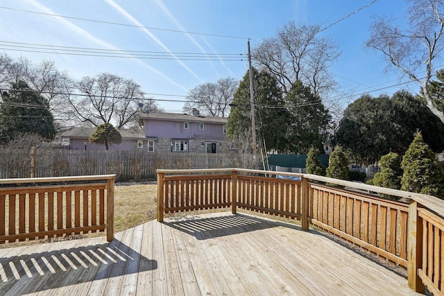 wooden deck featuring fence