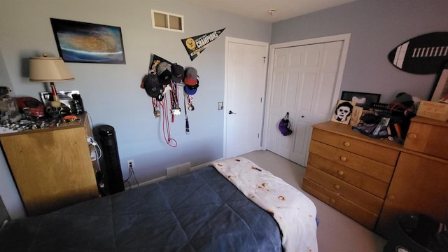 bedroom with visible vents