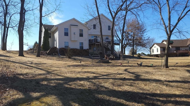 view of home's exterior featuring stairs