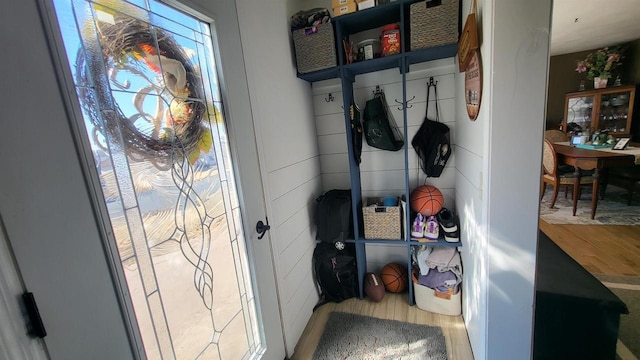 mudroom with wood finished floors