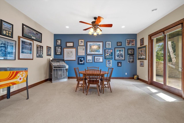 carpeted dining area featuring a ceiling fan, recessed lighting, and baseboards