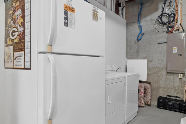 washroom with electric panel, independent washer and dryer, and laundry area