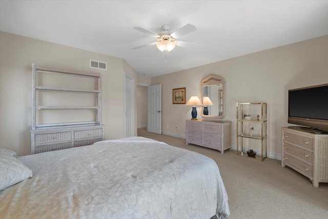 bedroom with visible vents, baseboards, carpet, and ceiling fan