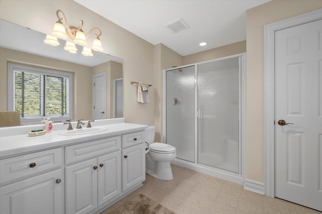 bathroom featuring visible vents, toilet, a stall shower, an inviting chandelier, and vanity