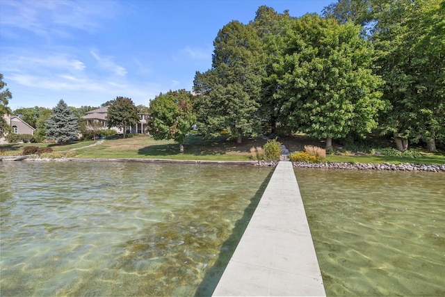 dock area featuring a water view