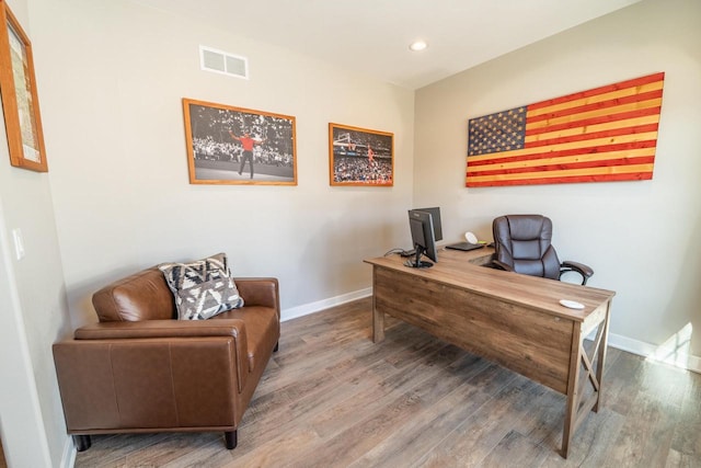 office area featuring recessed lighting, visible vents, baseboards, and wood finished floors