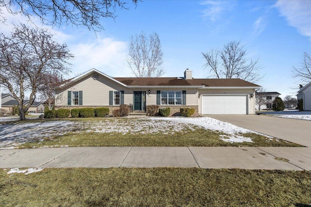 ranch-style house with a garage, concrete driveway, and a chimney