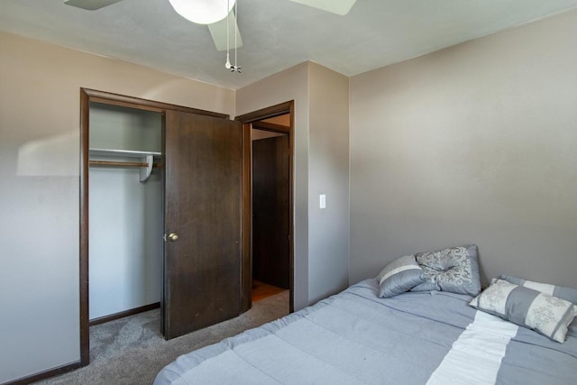 bedroom featuring a closet, baseboards, a ceiling fan, and carpet flooring