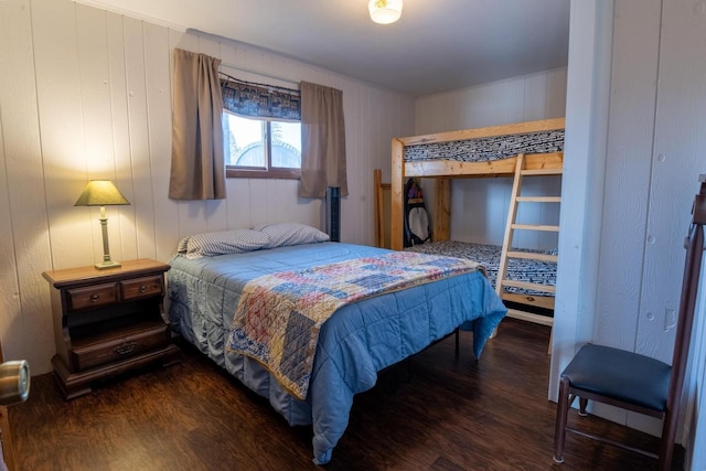 bedroom featuring wood finished floors