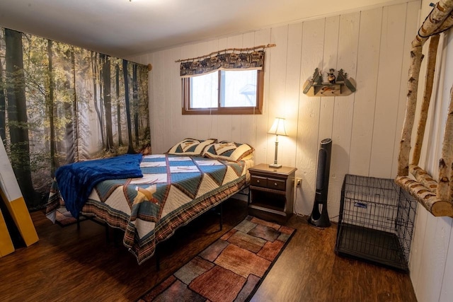 bedroom featuring wood finished floors