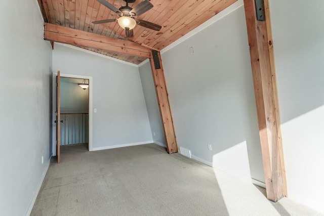 unfurnished bedroom featuring visible vents, baseboards, carpet floors, lofted ceiling, and wooden ceiling