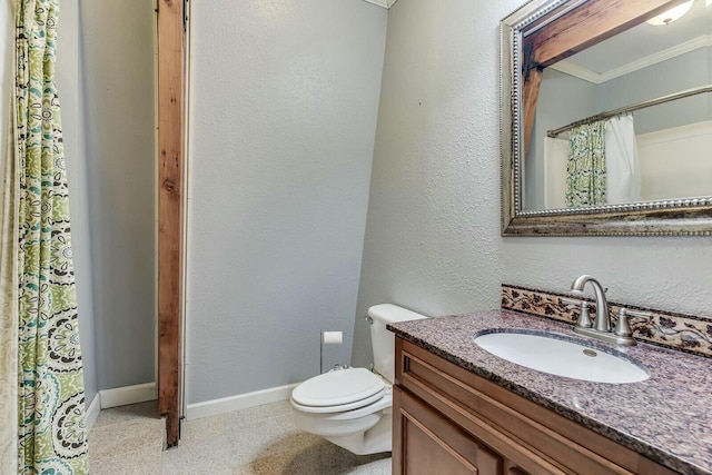 full bath with baseboards, toilet, ornamental molding, a textured wall, and vanity