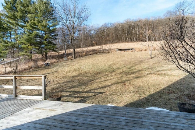 view of yard with a wooden deck