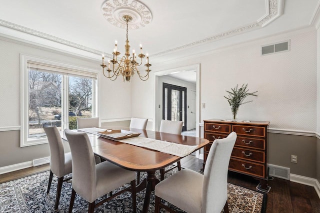 dining room featuring visible vents, wallpapered walls, dark wood-type flooring, and baseboards