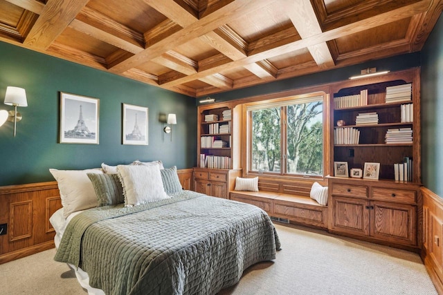 bedroom featuring beam ceiling, wooden ceiling, coffered ceiling, and light carpet