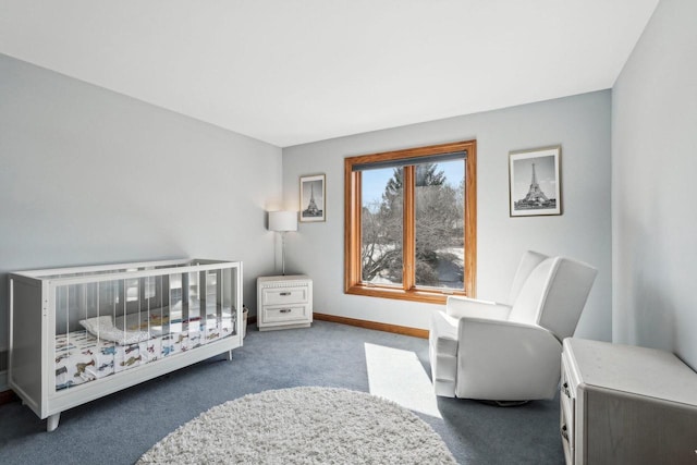 bedroom featuring baseboards and carpet flooring