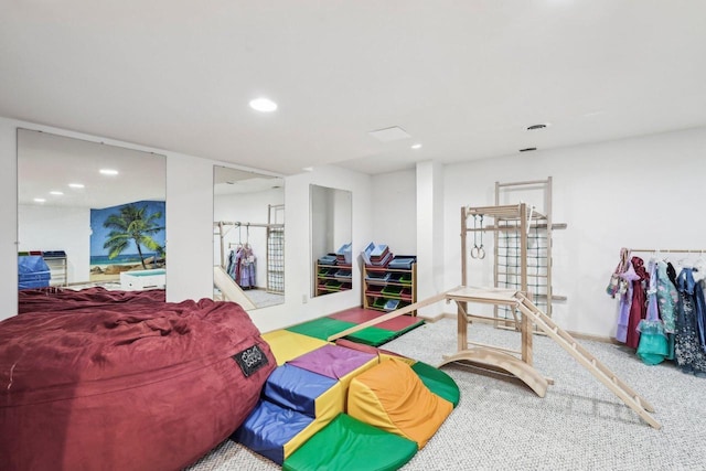 rec room with recessed lighting and baseboards