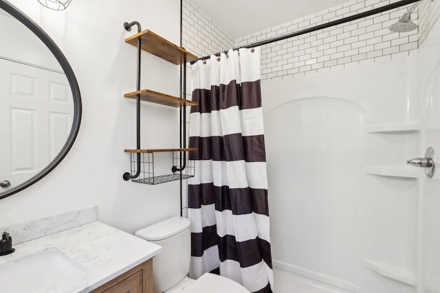 bathroom with vanity, toilet, and a shower with curtain