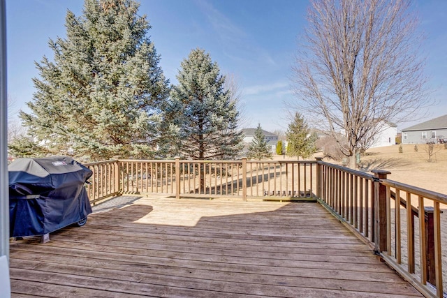 wooden deck with grilling area