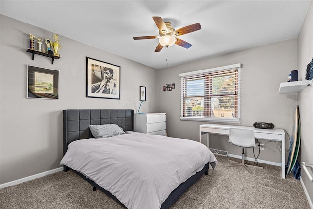 carpeted bedroom with visible vents, ceiling fan, and baseboards