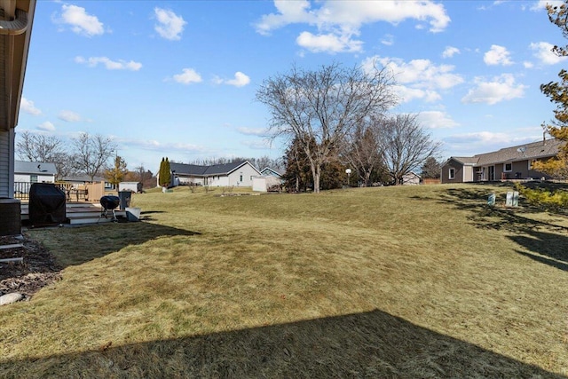 view of yard with a deck