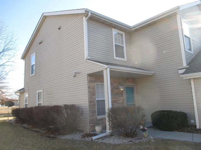 view of home's exterior with stone siding