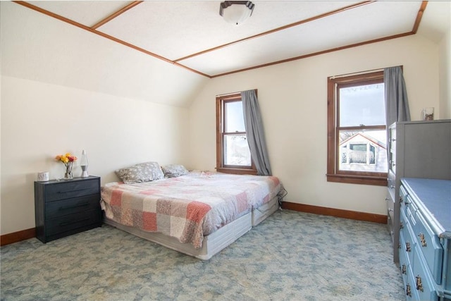 bedroom with vaulted ceiling, baseboards, and light carpet