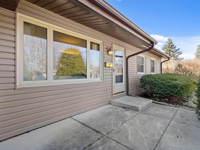 property entrance with a patio