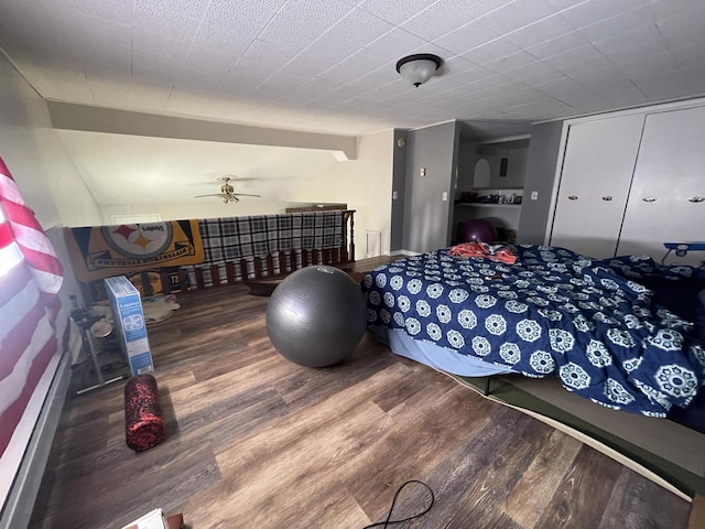 bedroom featuring wood finished floors