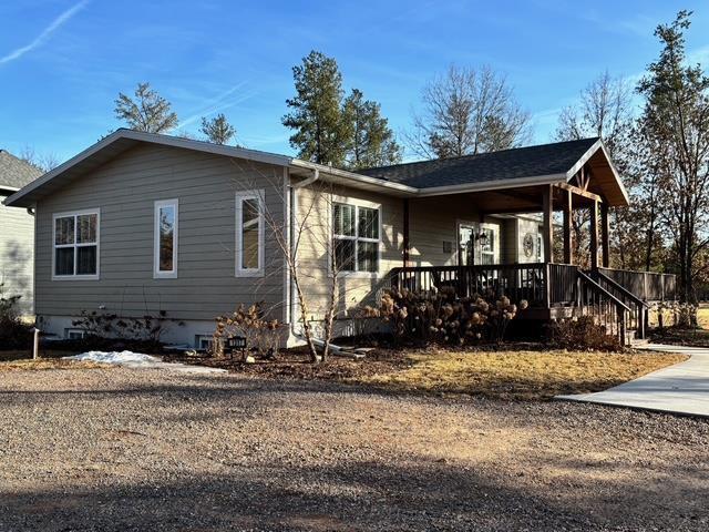 view of home's exterior featuring a porch