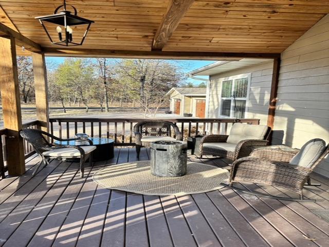 deck with an outdoor structure