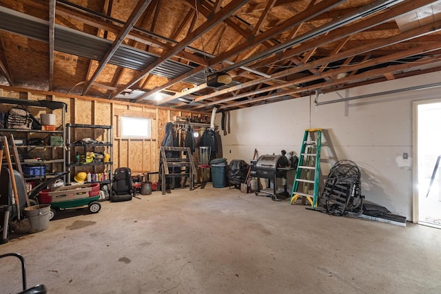 garage featuring a garage door opener