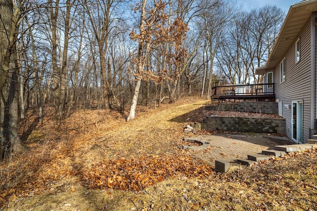 view of yard with a deck