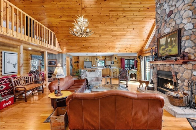 living room featuring rustic walls, a fireplace, wooden ceiling, and wood finished floors