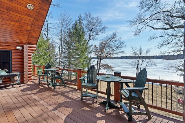 deck featuring a water view