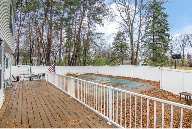 227 Donatelle St, Amery, WI 54001 - wooden deck with a fenced backyard